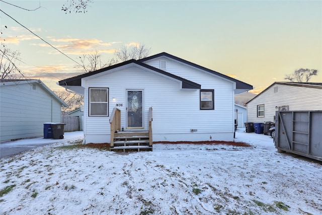 view of snow covered property