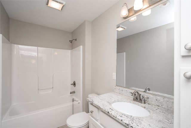 full bathroom with vanity,  shower combination, and toilet