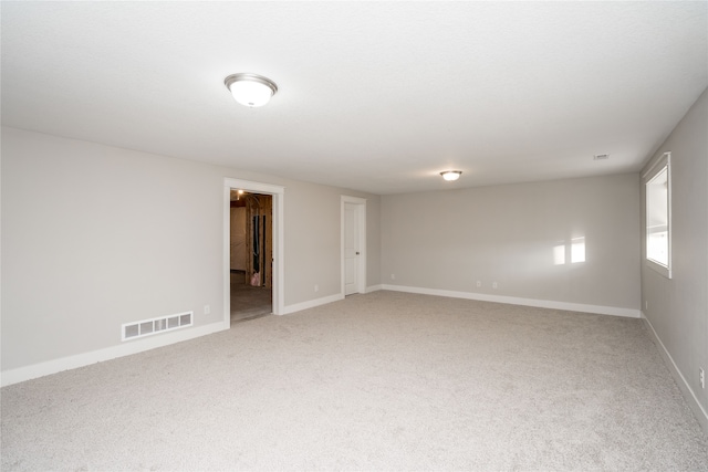 empty room featuring carpet floors