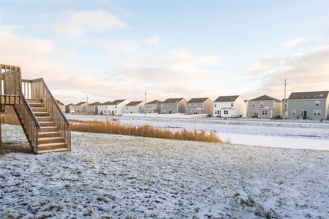 view of yard layered in snow