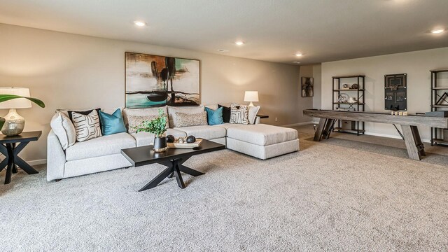 carpeted living room with baseboards and recessed lighting