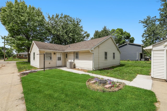 view of front of property with a front lawn