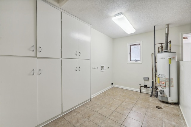 clothes washing area with cabinets, hookup for a washing machine, a textured ceiling, gas water heater, and electric dryer hookup