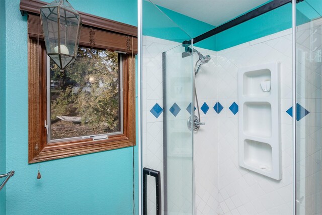 bathroom featuring walk in shower