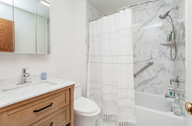 full bathroom with vanity, shower / bath combination with curtain, and toilet