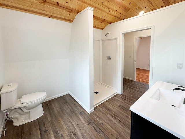 bathroom with hardwood / wood-style floors, vanity, wooden ceiling, toilet, and walk in shower