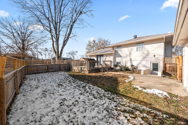 view of yard with a wooden deck