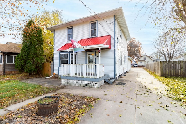 view of front property with a wooden deck