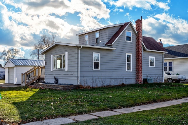 view of side of home featuring a lawn