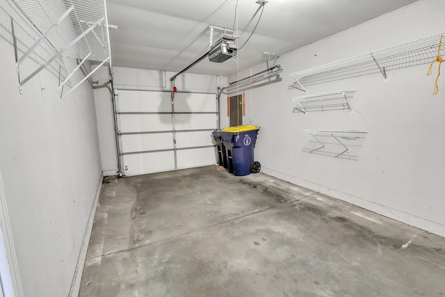 garage featuring a garage door opener