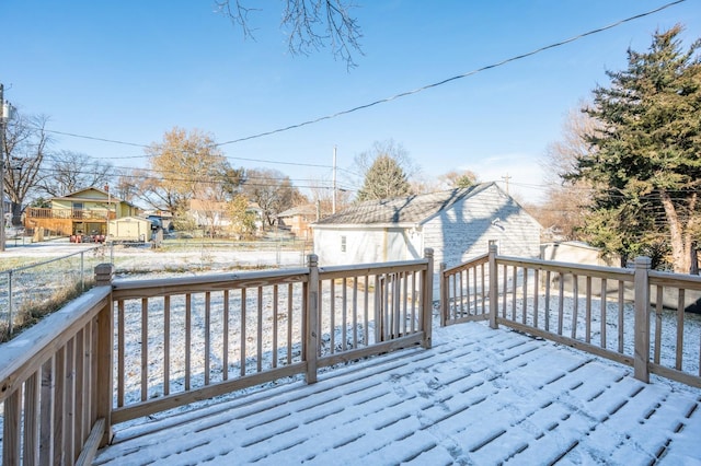 view of snow covered deck