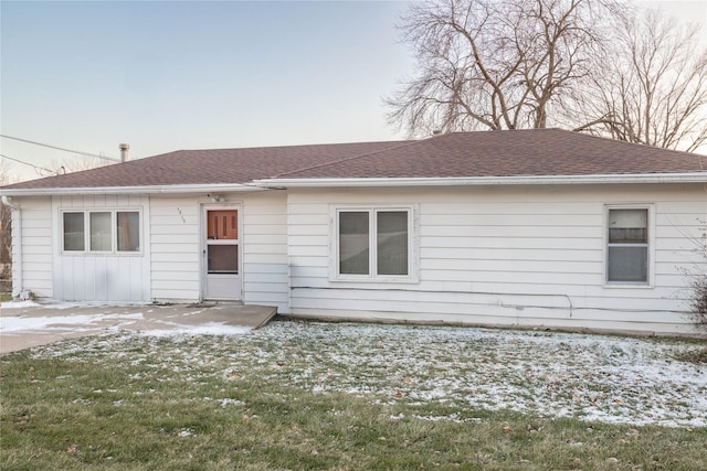 view of front of home with a lawn