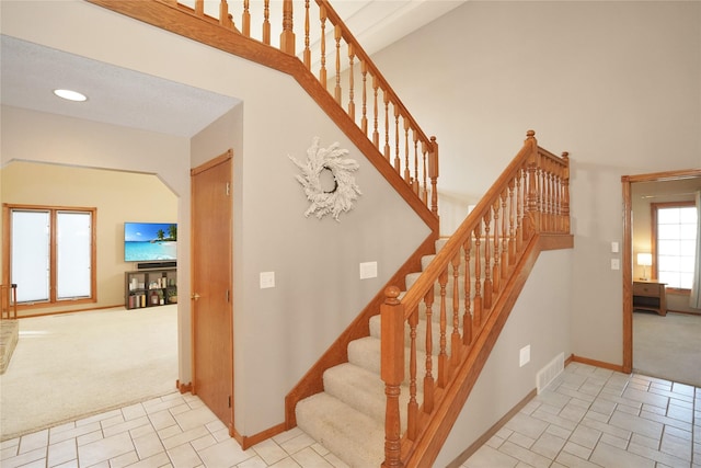 stairway with carpet flooring