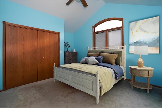 carpeted bedroom featuring ceiling fan, vaulted ceiling, and a closet