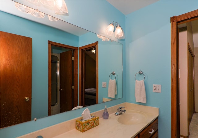 bathroom with vanity and walk in shower