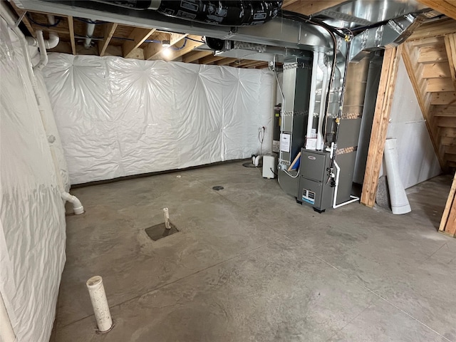 basement featuring heating unit