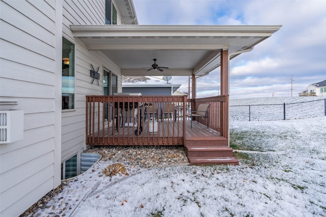 snow covered deck with ceiling fan