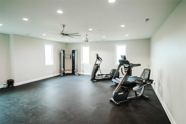 exercise room with ceiling fan