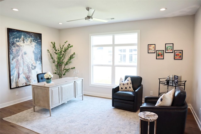 home office featuring ceiling fan and light wood-type flooring