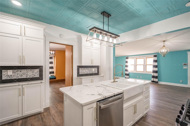 kitchen with white cabinets, pendant lighting, and dishwasher