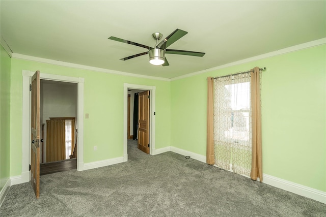 unfurnished bedroom with carpet floors, ceiling fan, and ornamental molding