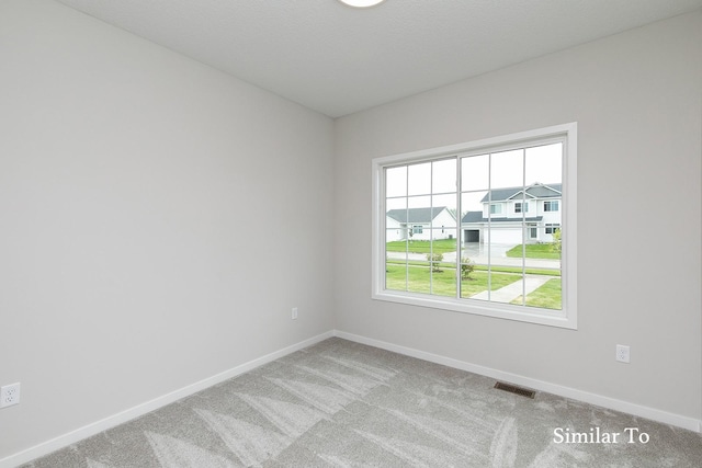 empty room with light carpet