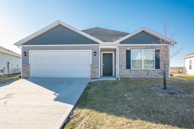 craftsman-style home featuring a garage and a front yard