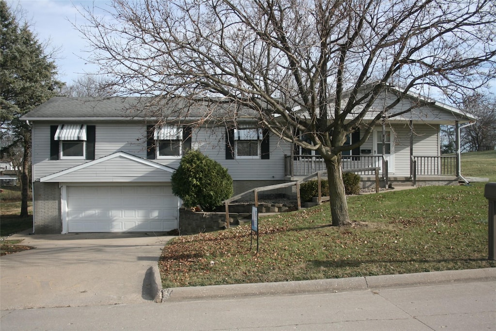 view of front of house with a porch and a front lawn