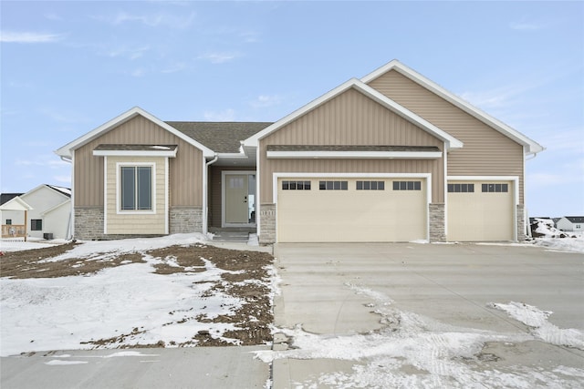 craftsman house with a garage