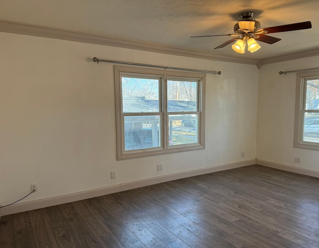 unfurnished room featuring a textured ceiling, ceiling fan, crown molding, and dark wood-type flooring