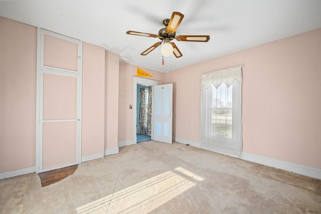 104 2nd Ave, Bagley, IA 50026 - carpeted spare room with ceiling fan