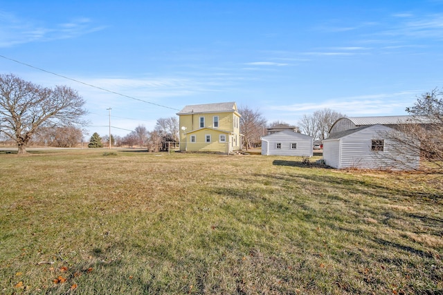 104 2nd Ave, Bagley, IA 50026 - view of yard featuring an outdoor structure