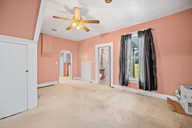 104 2nd Ave, Bagley, IA 50026 - carpeted empty room featuring beam ceiling and ceiling fan