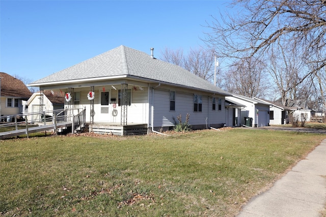 view of front of home featuring a front yard and a porch