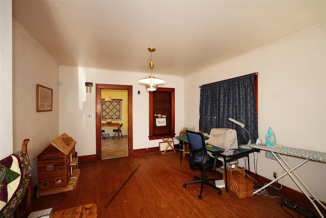 office with dark hardwood / wood-style floors