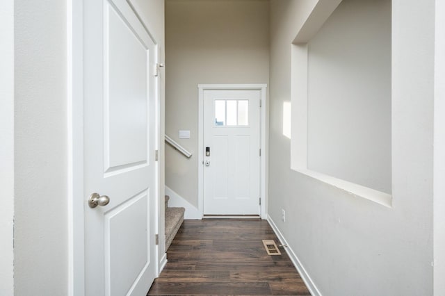 doorway to outside featuring dark hardwood / wood-style floors