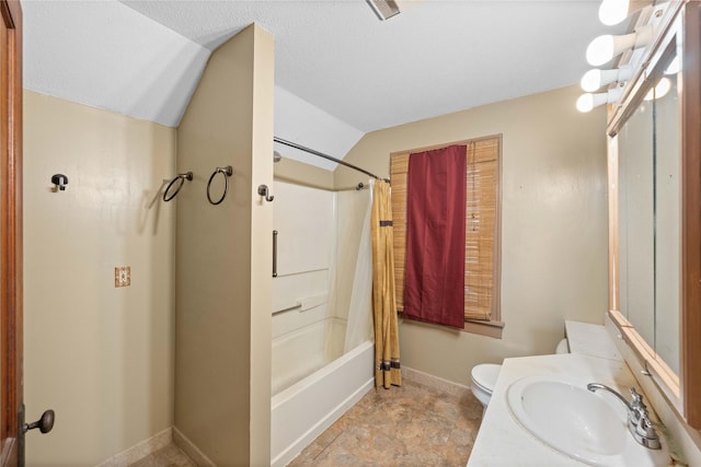 full bathroom featuring shower / bath combination with curtain, a textured ceiling, vaulted ceiling, toilet, and vanity