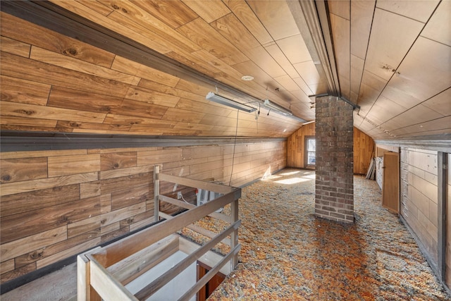 bonus room featuring dark colored carpet, lofted ceiling, wood walls, and wooden ceiling