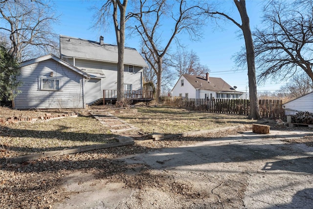 rear view of property with a deck