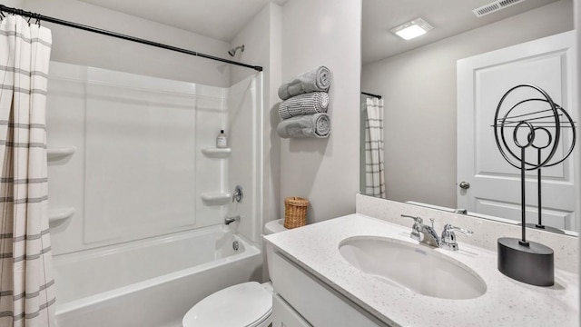 full bathroom with toilet, vanity, and shower / tub combo with curtain