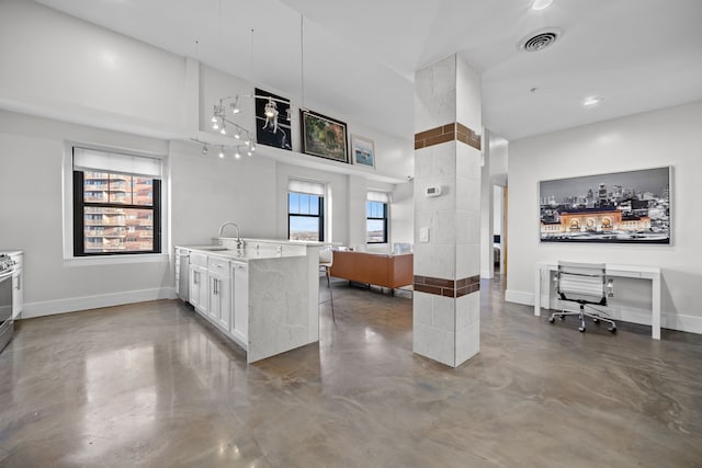 kitchen with white cabinets and sink