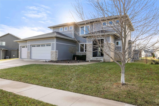 prairie-style house with a garage and a front yard