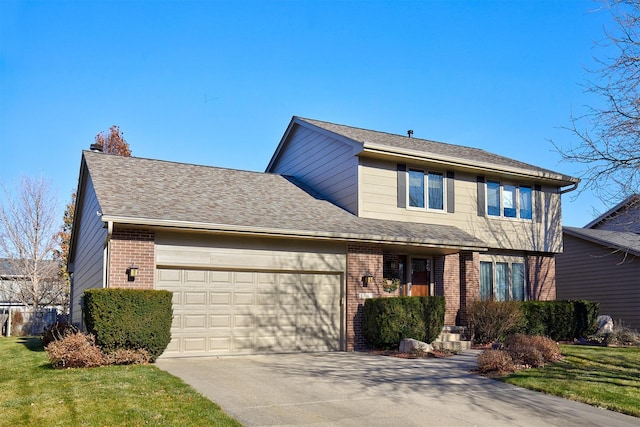 view of front facade featuring a garage and a front yard