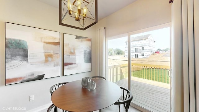1223 NE Deerfield Dr, Ankeny, IA 50021 - dining space with a chandelier and baseboards