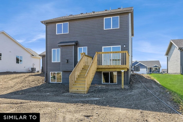 back of property featuring central AC and a wooden deck