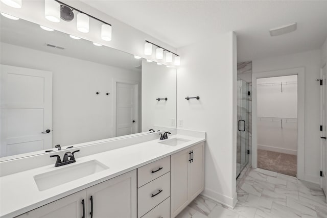 bathroom with vanity and walk in shower