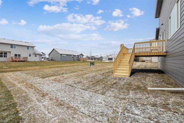 view of yard with a wooden deck