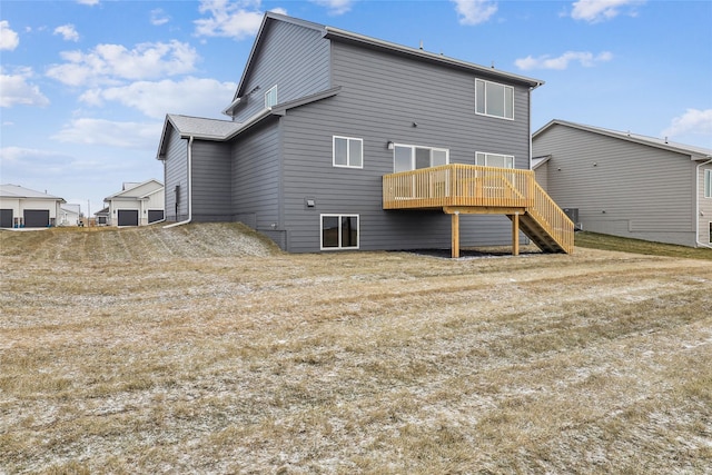 rear view of house featuring a wooden deck and central air condition unit