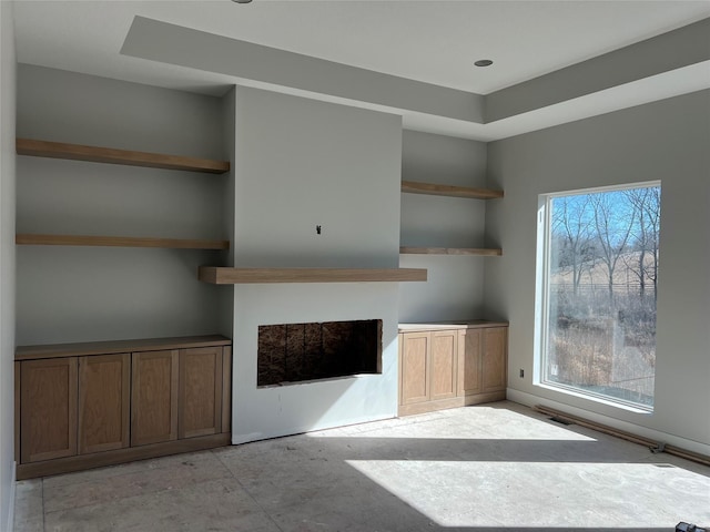 unfurnished living room with a fireplace