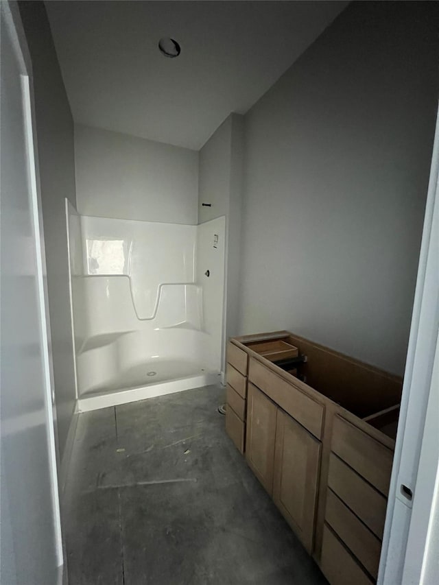 bathroom featuring a stall shower